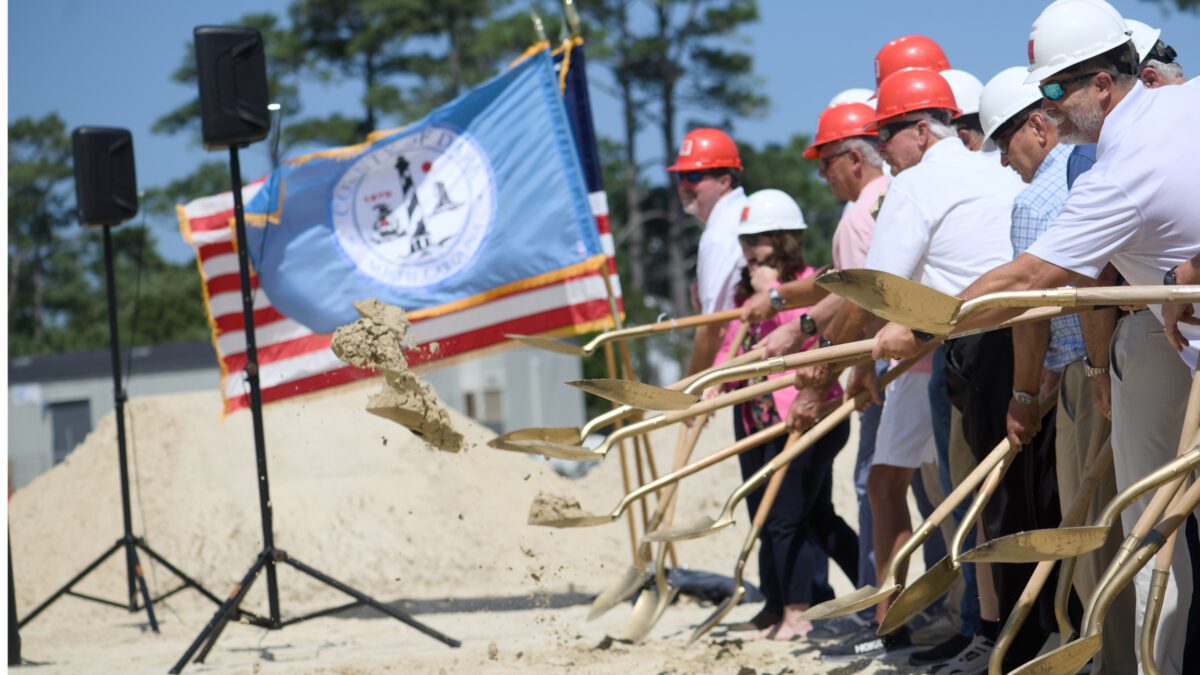 Dirt flies as Dare County elected officials break ground for the early college building on the College of the Albemarle Manteo campus. Photo: Kip Tabb