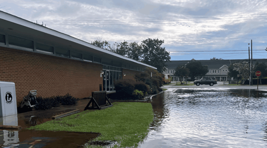 The flooding at and around the Manteo Library was caused by a storm that arrived Thursday with rainfall that continued overnight. Photo: Dare County