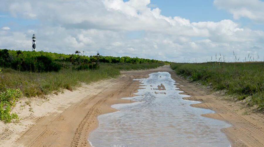 Standing water remains on the road near the Cape Lookout Lighthouse Friday. Photo: NPS