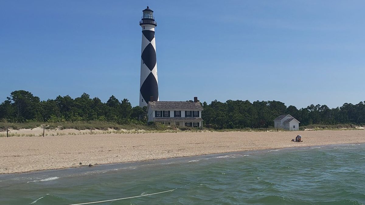 The Cape Lookout Lighthouse and Keepers' Quarters as they appeared on a sunny Sunday afternoon in July. Photo: Jennifer Allen