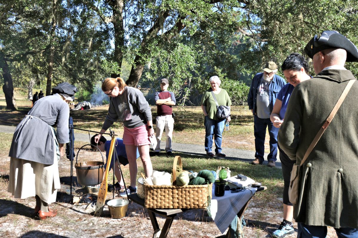 A dyeing demonstration, similar to this scene from a past event, will be part of a living history program Saturday at Brunswick Town/Fort Anderson State Historic Site. Photo: N.C. Department of Natural and Cultural Resources