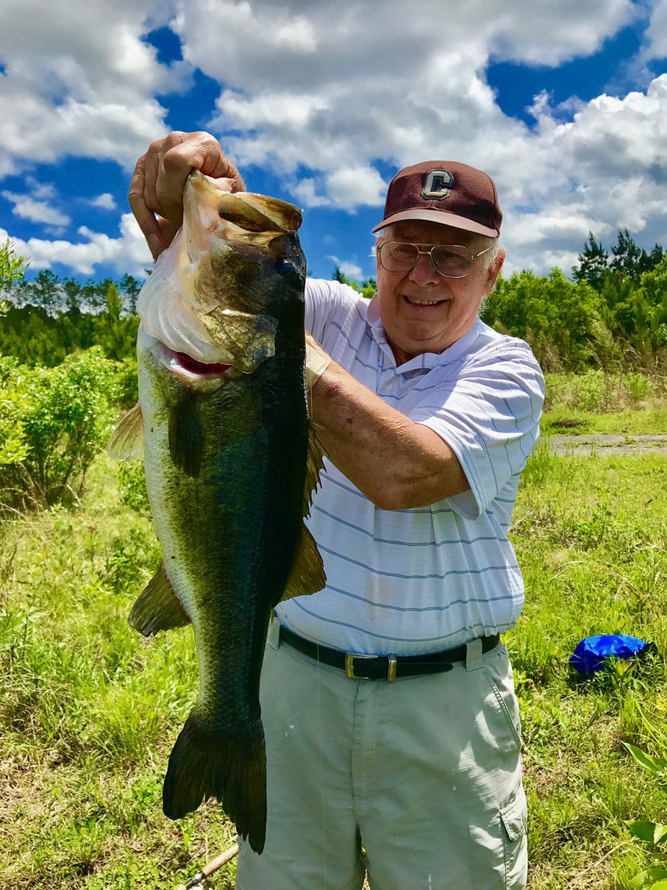 My father, Don Churchill proudly shows of this huge bass he caught when he was 79. Photo: From the author's collection