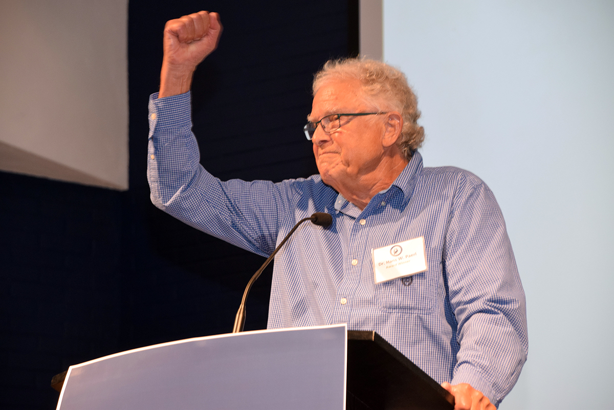Hans Paerl accepts his Lifetime Achievement Pelican Award Saturday “For a Distinguished Career Dedicated to Coastal Research, Protection, and Restoration" during a ceremony at Joslyn Hall on the Carteret Community College campus. Photo: Mark Hibbs
