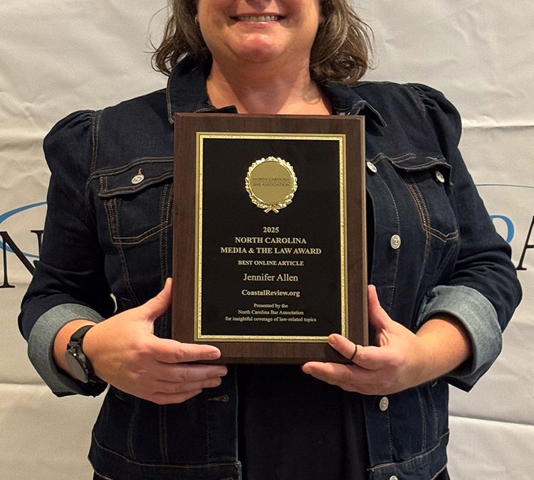 Jennifer Allen poses with her Media and the Law Award of Excellence from the North Carolina Bar Association Thursday in Cary. Photo: Vicki Hibbs