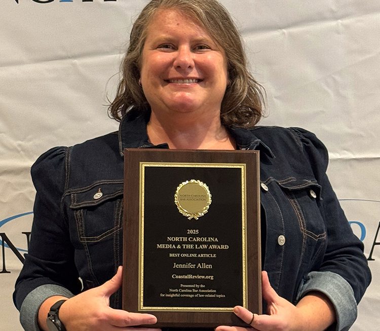 Jennifer Allen poses with her Media and the Law Award of Excellence from the North Carolina Bar Association Thursday in Cary. Photo: Vicki Hibbs