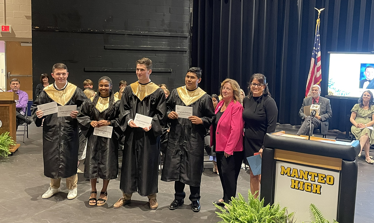 Manteo High School students, from left, Spencer Twiford, Mya Kelly, Samuel Cage, and Julian Alvarez Isidoro receive their scholarship awards alongside 2025 Outer Banks Association of Realtors President Christi Bryant and 2025 Property Management Director Carrie Bateman. Photo: Outer Banks Association of Realtors