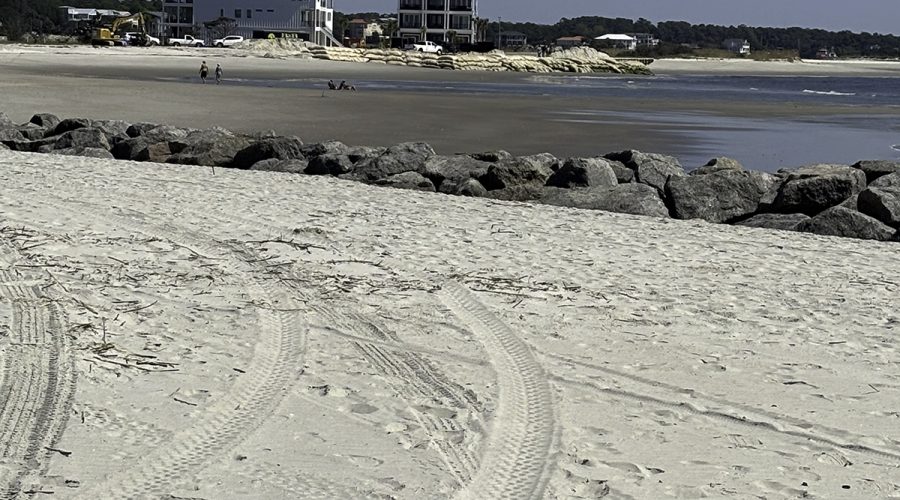 A view looking east of Ocean Isle Beach's terminal groin, where sandbags hold off beachfront erosion. Photo: Trista Talton