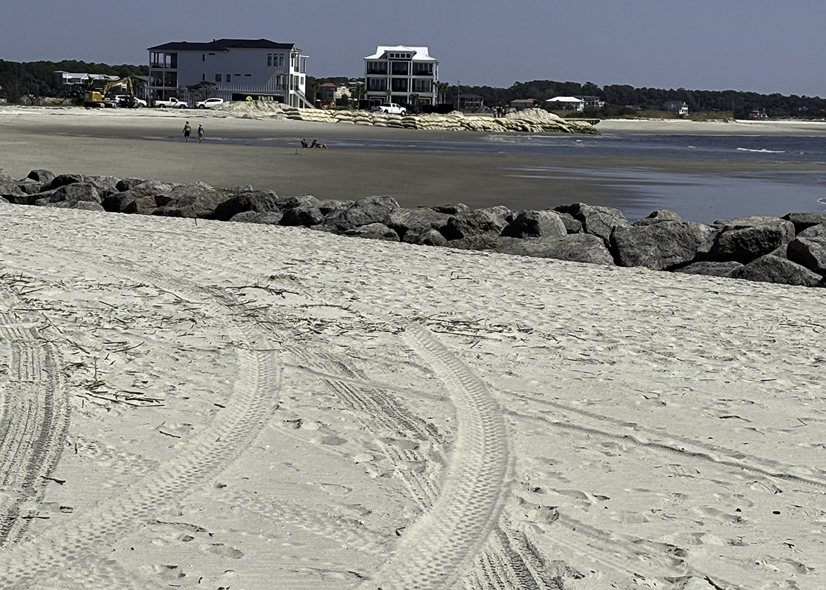 A view looking east of Ocean Isle Beach's terminal groin, where sandbags hold off beachfront erosion. Photo: Trista Talton