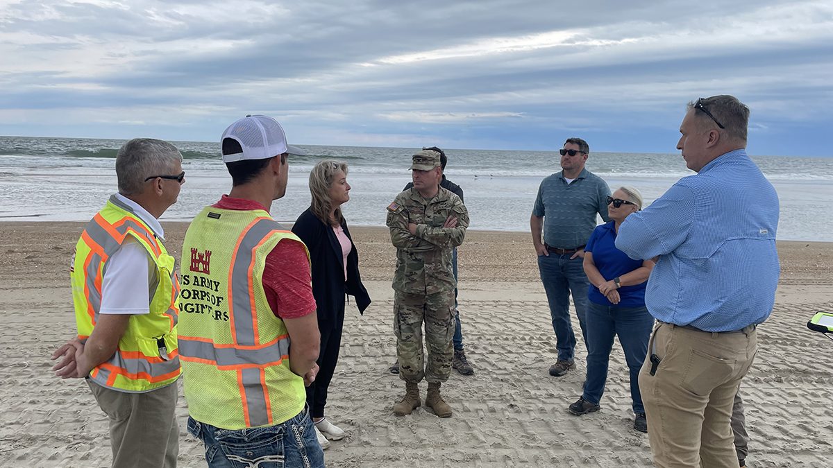 Federal, state and county officials gather Thursday at the Buxton Beach access where there was no petroleum sheen or order detected after Hurricane Erin. Photo: Army Corps of Engineers