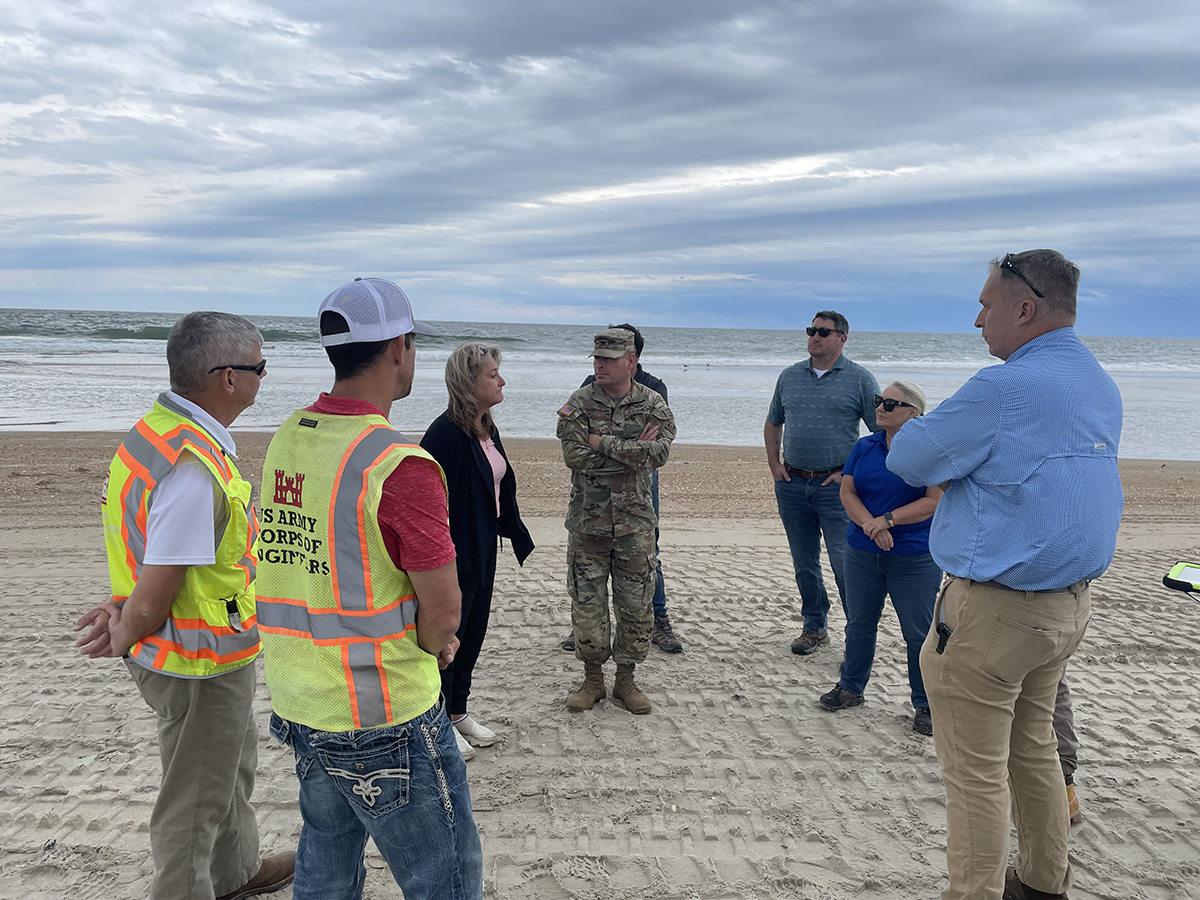 Federal, state and county officials gather Thursday at the Buxton Beach access where there was no petroleum sheen or order detected after Hurricane Erin. Photo: Army Corps of Engineers