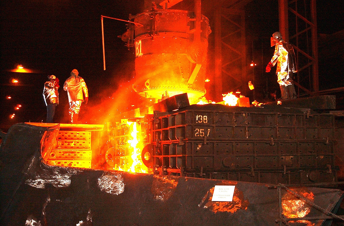 Workers in an unnamed steel mill are shown in this public domain photo by Jean Beaufort. 