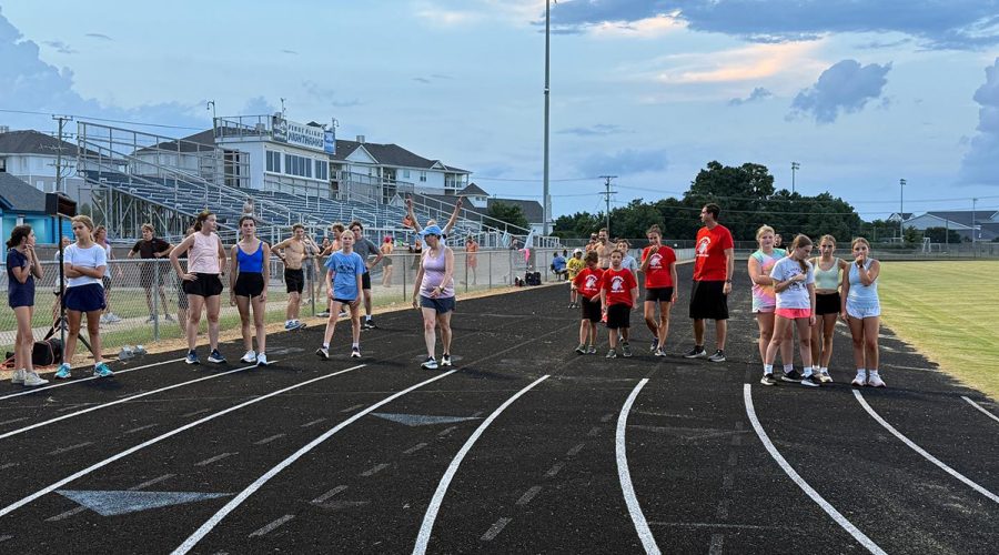 Members of the First Flight Track Club formed in 2024 take to the track for the club's inaugural summer season. Photo contributed.