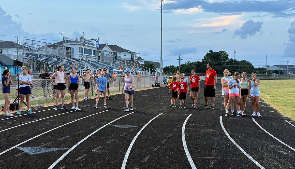 Members of the First Flight Track Club formed in 2024 take to the track for the club's inaugural summer season. Photo contributed.