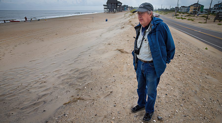 Dr. Stan Riggs takes in the view on Hatteras Island in July. Photo contributed.
