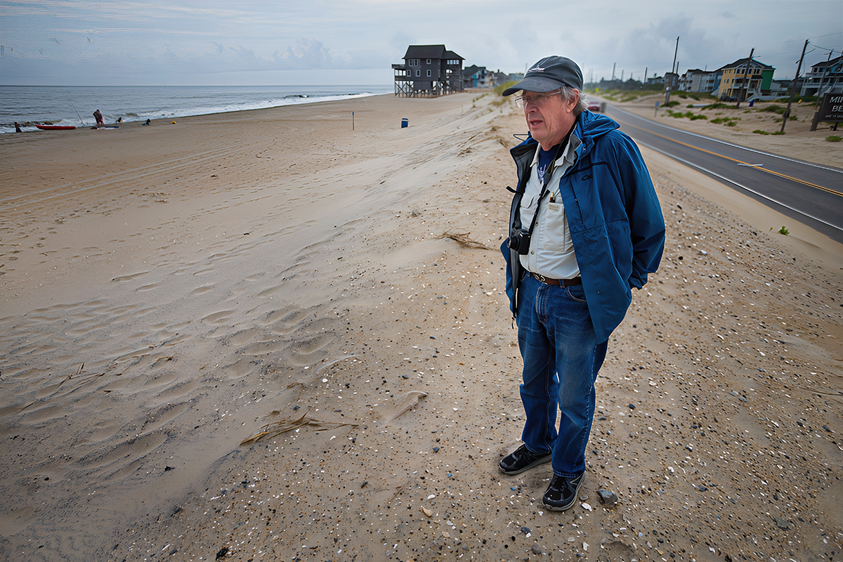 Dr. Stan Riggs takes in the view on Hatteras Island in July. Photo contributed.