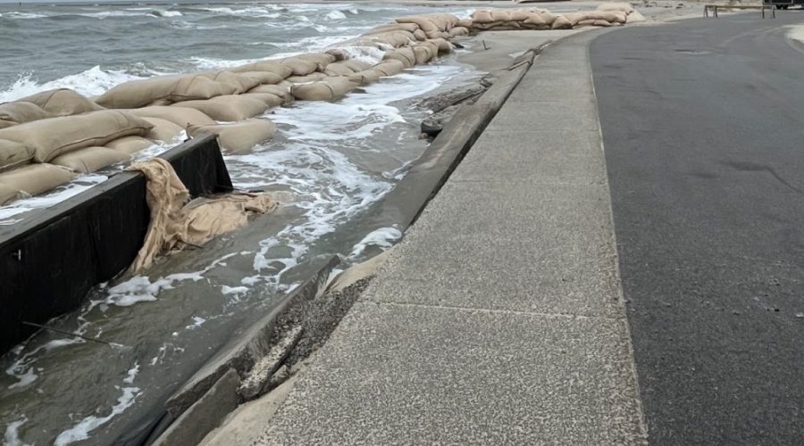 Sandbags line the roadway through The Pointe at Ocean Isle Beach. Photo: NCDEQ