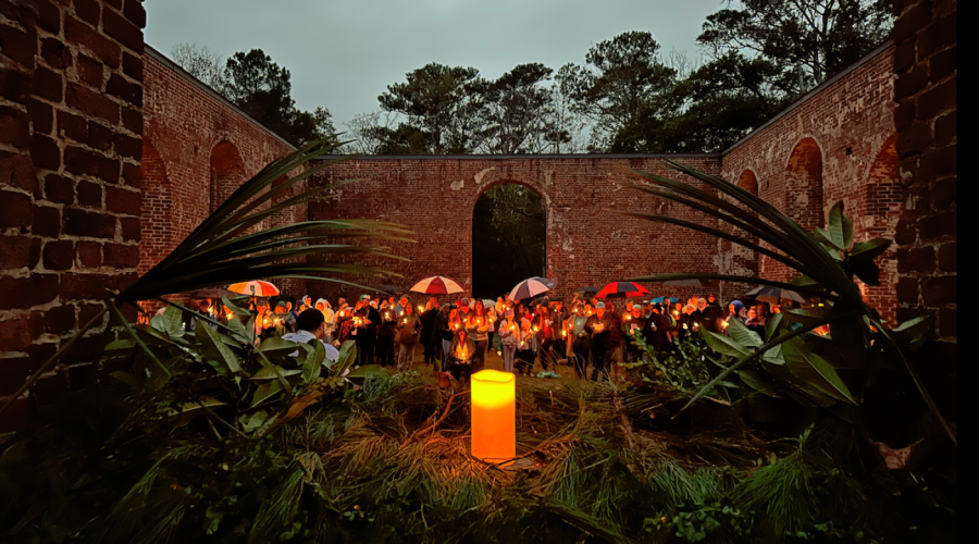 Visitors gather at the ruins of St. Phillips Church during an 18th Century Christmas at Brunswick Town. Photo: NCDNCR