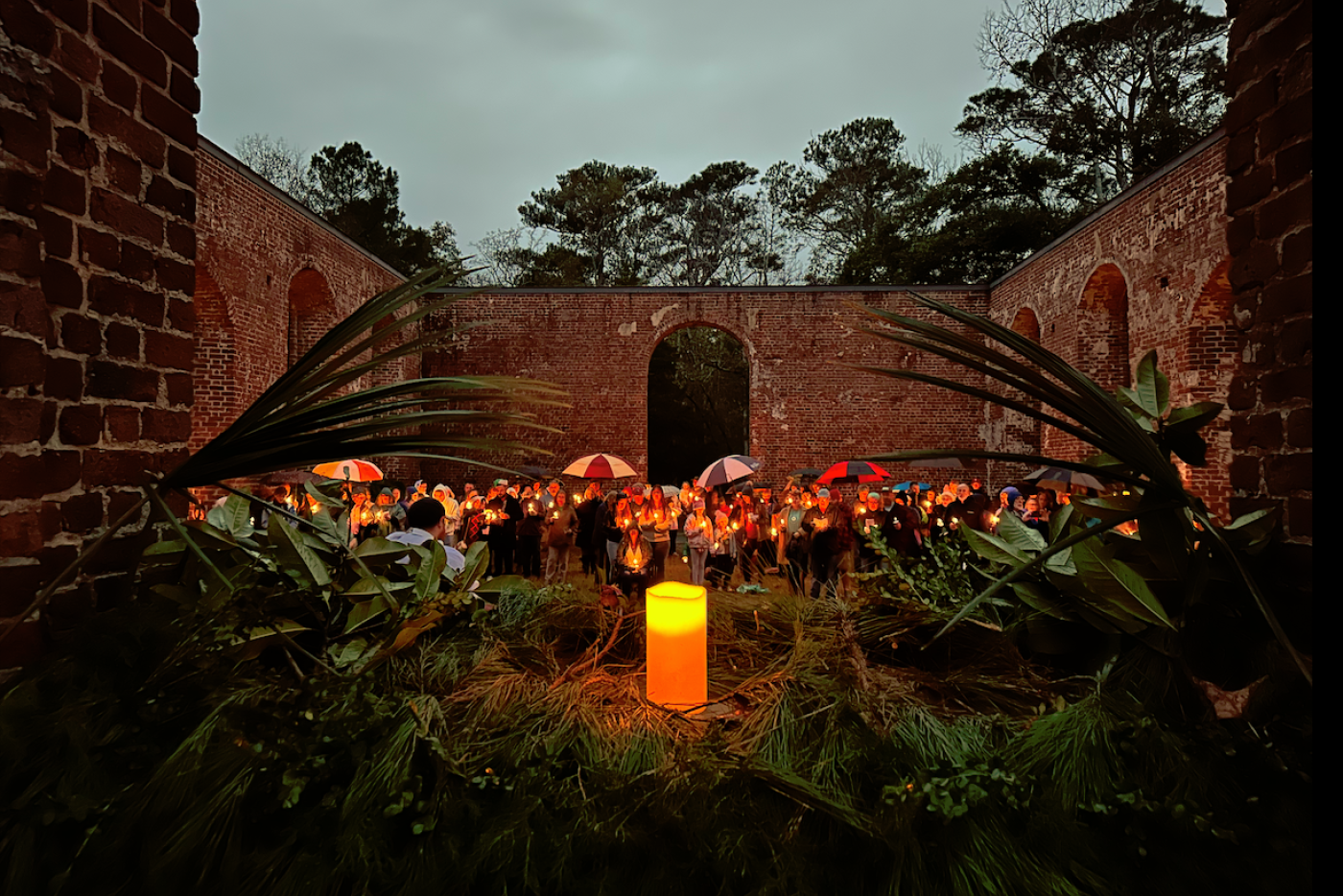 Visitors gather at the ruins of St. Phillips Church during an 18th Century Christmas at Brunswick Town. Photo: NCDNCR