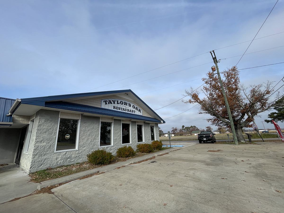 Taylor’s Oak Restaurant sits on land that has long been in the Taylor family. The tree in front of the business is a local landmark known as “Taylor’s oak.” Photo: Liz Biro