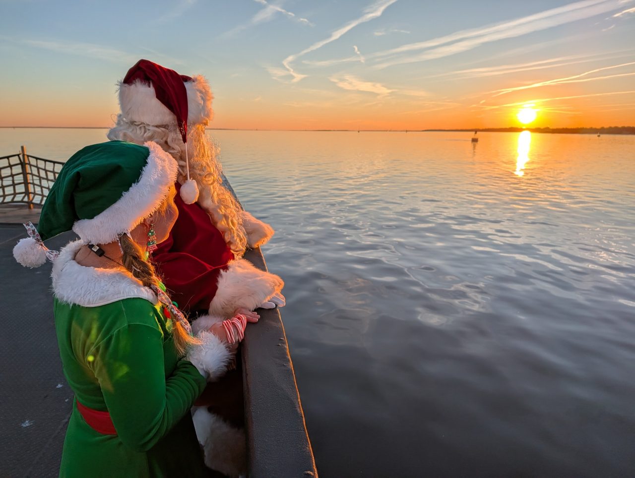 Santa and his helper observe the sunset Dec. 12 from aboard the Southport-Fort Fisher ferry. Photo: NCDOT
