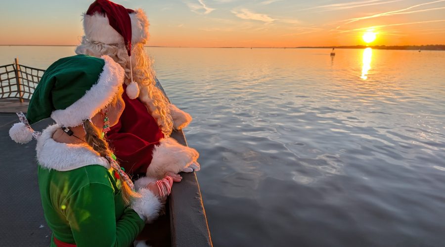 Santa and his helper observe the sunset Dec. 12 from aboard the Southport-Fort Fisher ferry. Photo: NCDOT