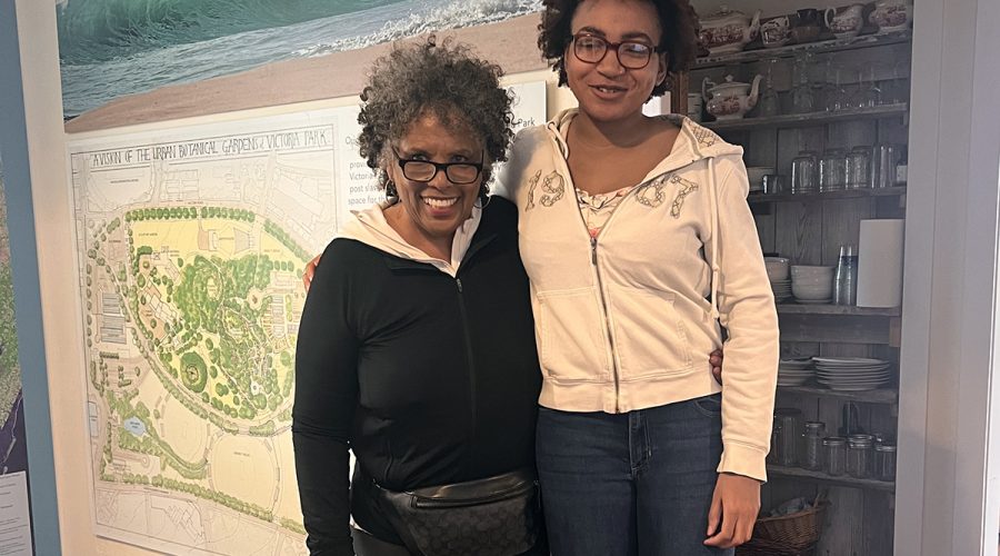 Joan Collins, left, is greeted by Kiara Brummell during Collins' first visit to The Water’s Edge in March 2025. Photo: Courtesy of Joan Collins
