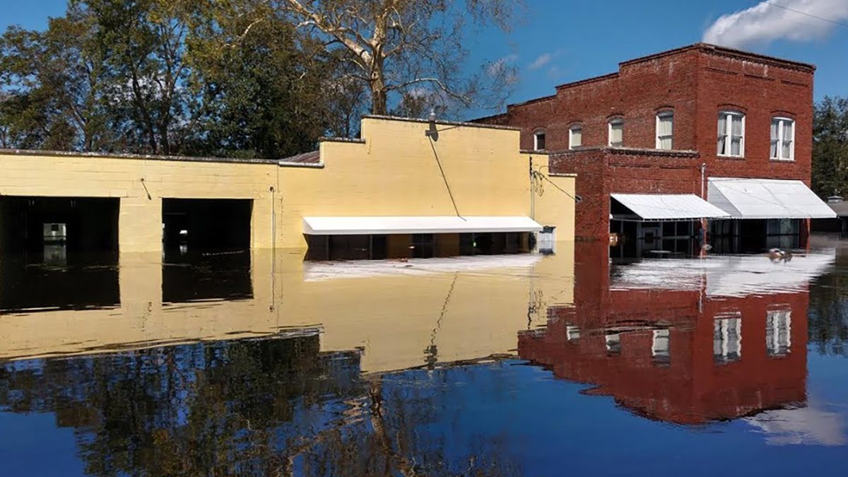 Pollocksville storefronts are shown during flooding related to Hurricane Florence in a video from the town's recovery and resilience webpage.