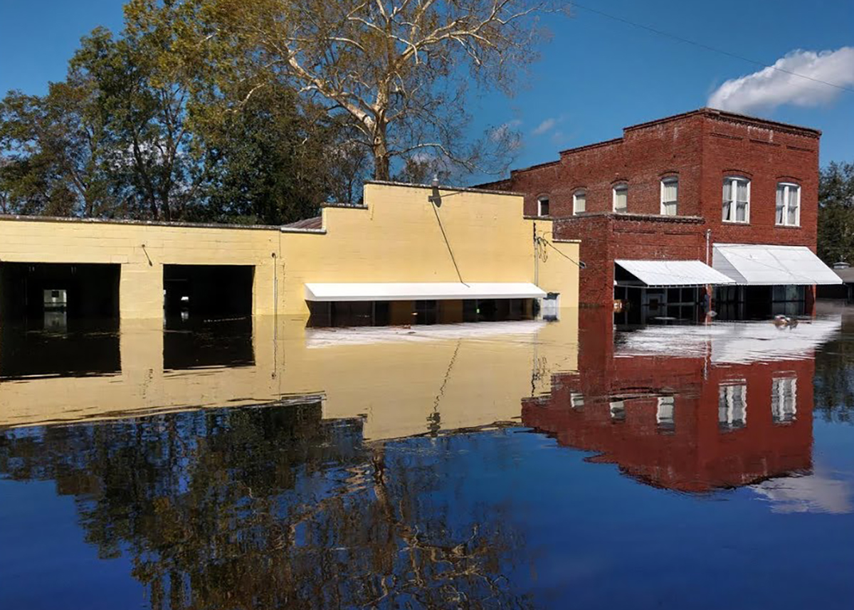 Pollocksville storefronts are shown during flooding related to Hurricane Florence in a video from the town's recovery and resilience webpage.