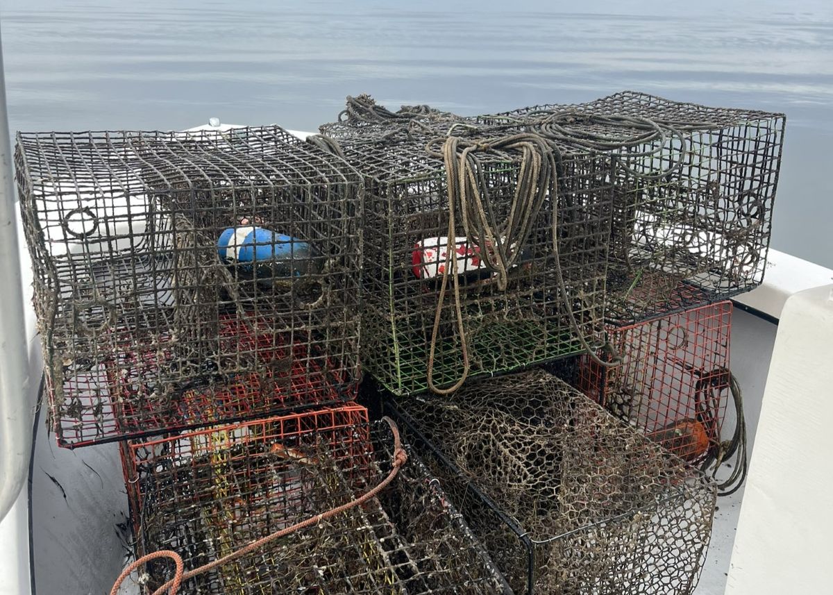 Crab pots are stacked after being recovered from coastal waters during a past Lost Fishing Gear Recovery Project. Photo: N.C. Coastal Federation