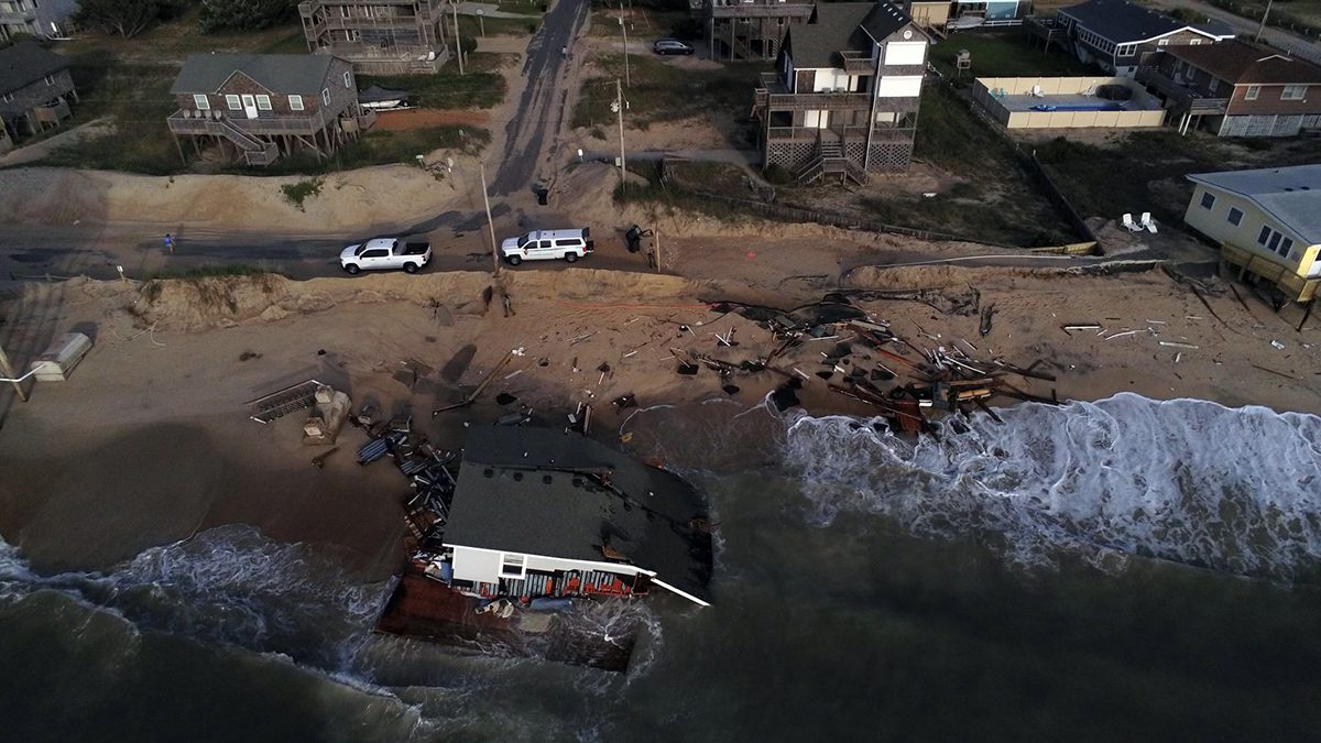 Waves spread debris associated with a house collapse at 24131 Ocean Drive in Rodanthe in May 2024. Photo: National Park Service