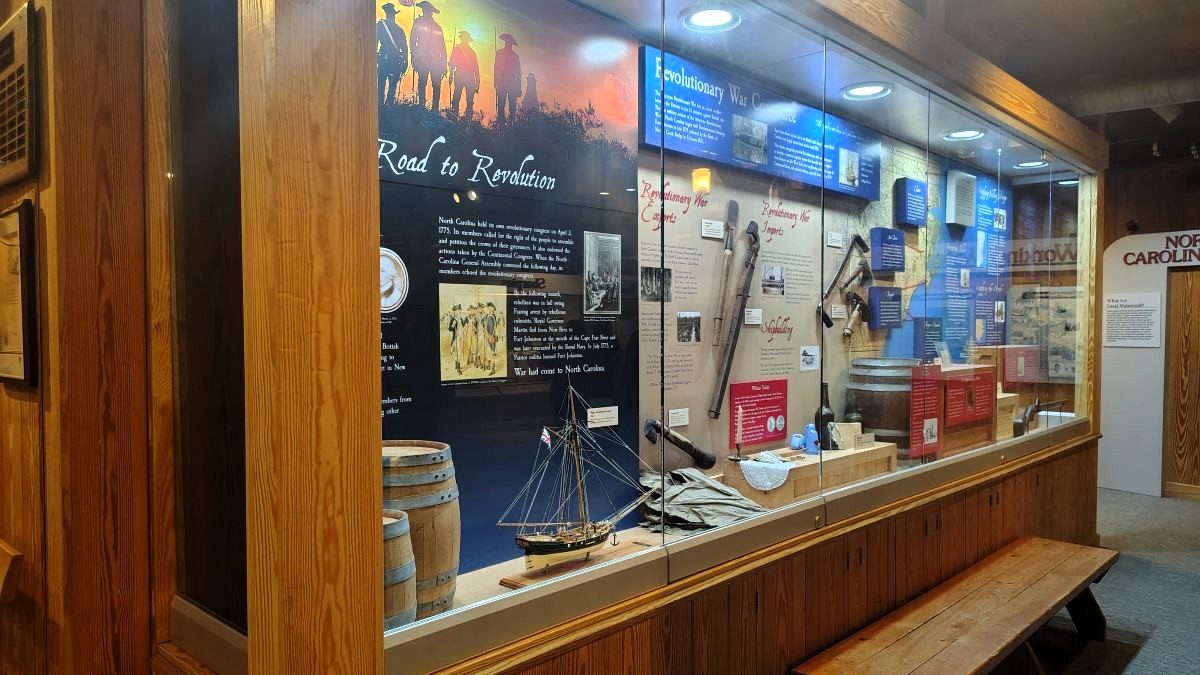N.C. Maritime Museum in Beaufort's new exhibit, "North Carolina's Road to Revolution" Feb. 19 during a ribbon cutting to celebrate the facility reopening after a yearlong closure for renovations. Photo: Jennifer Allen