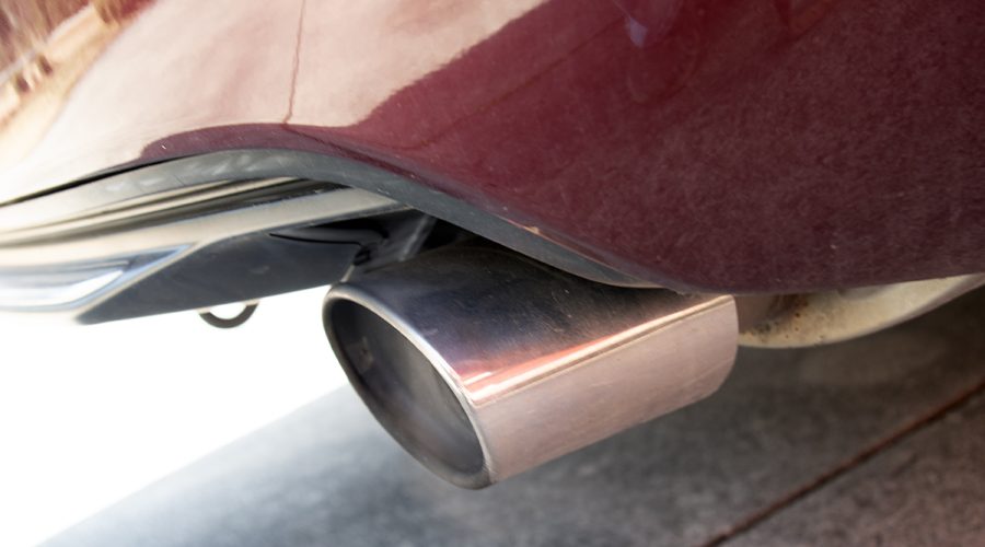A gasoline-powered car emits exhaust . Photo: Mark Hibbs