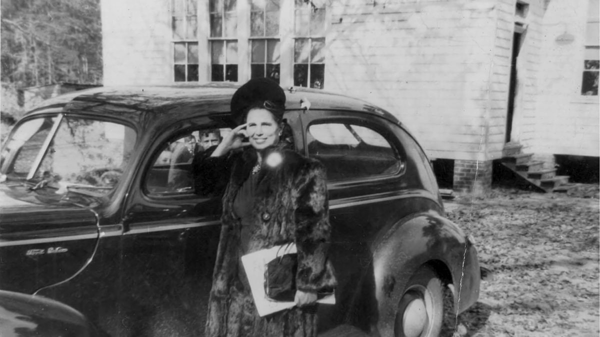 Ardelle Garett, a Pleasant Plains teacher and principal, is shown with the school's original steps and entrance to its south classroom in the 1940s. Photo: National Register of Historic Places, photo courtesy of Marvin Jones