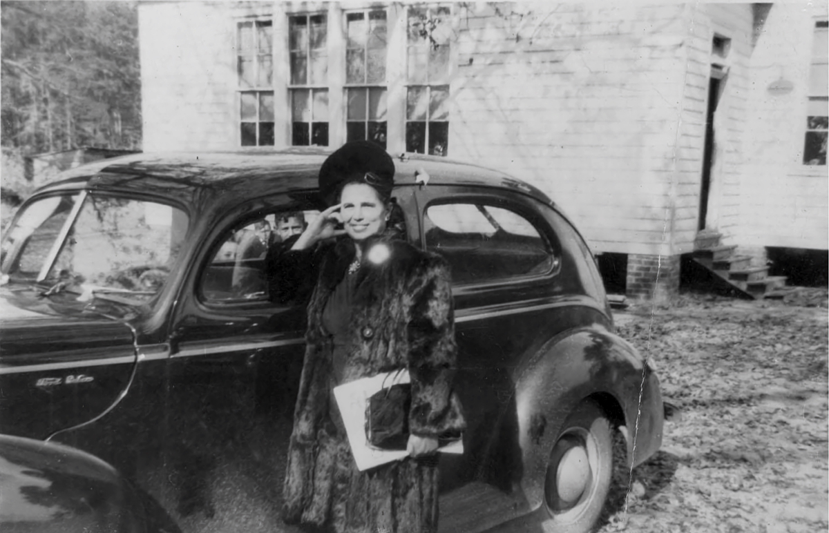 Ardelle Garett, a Pleasant Plains teacher and principal, is shown with the school's original steps and entrance to its south classroom in the 1940s. Photo: National Register of Historic Places, courtesy of Marvin Jones