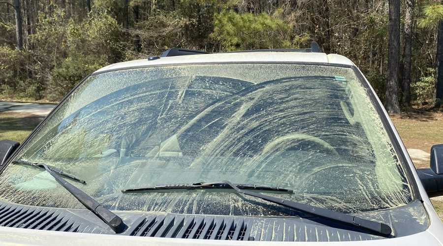Activating the windshield-washer fluid and the windshield wipers results in yellow sludge with the consistency of Karo syrup. Photo: Heidi S. Skinner