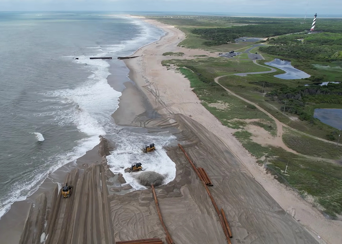 The beach nourishment project at Hatteras Island, just north of the groin near the lighthouse's former, original location, is shown in this screen grab from a March 10 Dare County video update.