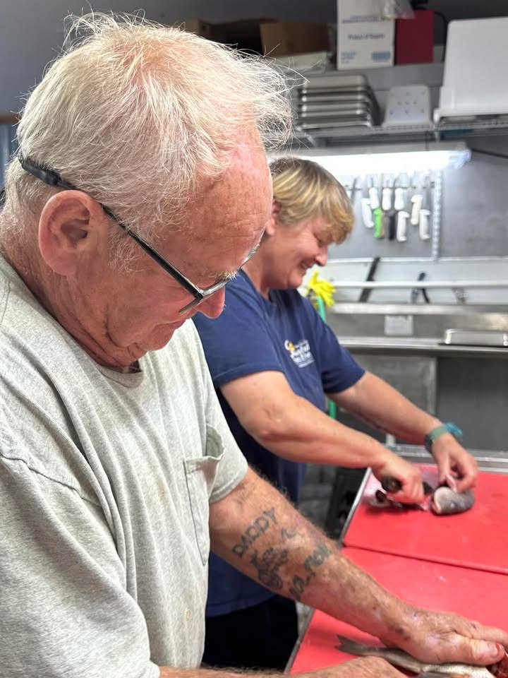 Heather and her father Rodney Rose work together in the kitchen at Rose Seafood. Photo: Rose Seafood