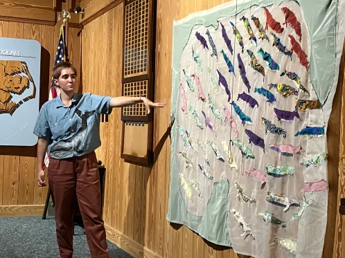 Marine biologist and artist Tommy Tucker at the Whales and Whaling Symposium at the N.C. Maritime Museum. Photo by David Cecelski
