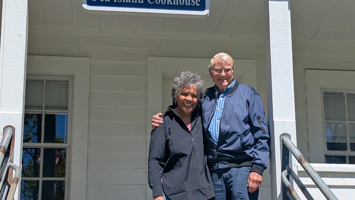 Joan Collins and Johnnie Willis pose on the Cookhouse porch.