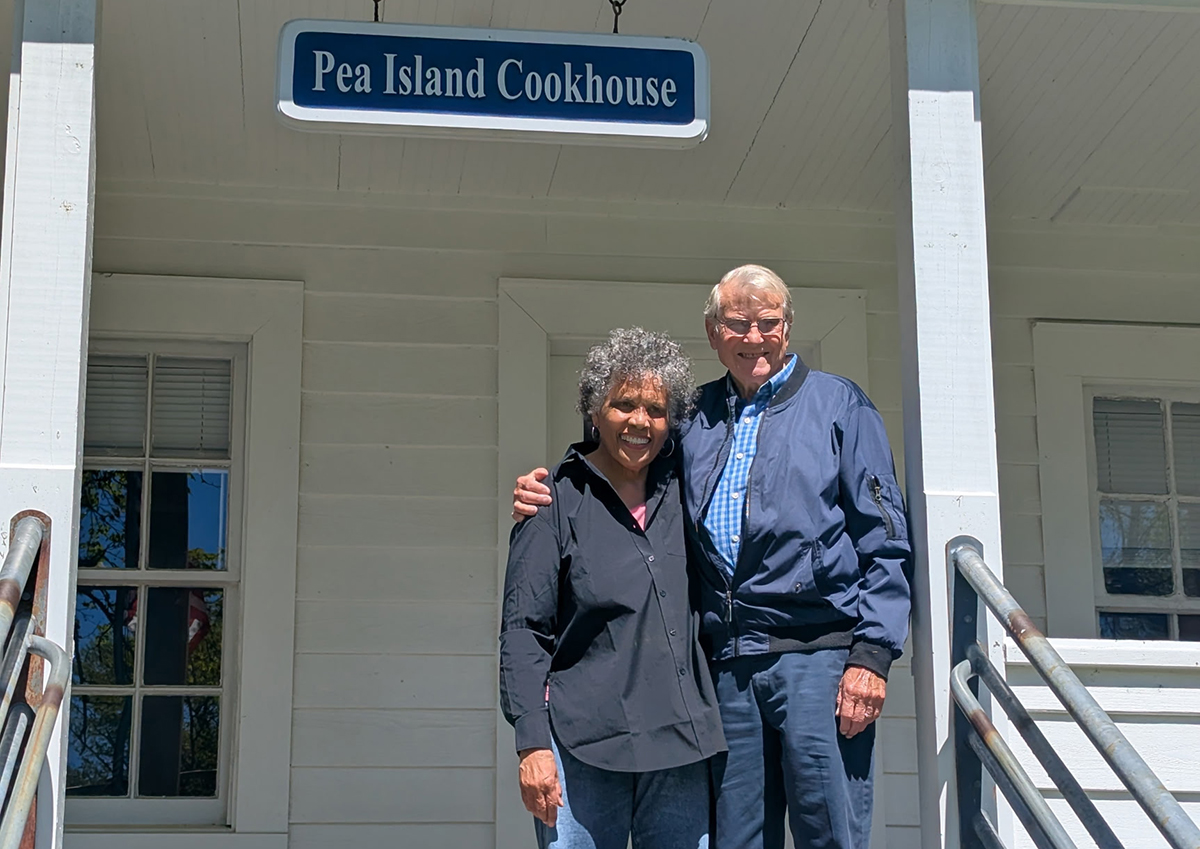 Joan Collins and Johnnie Willis pose on the Cookhouse porch.