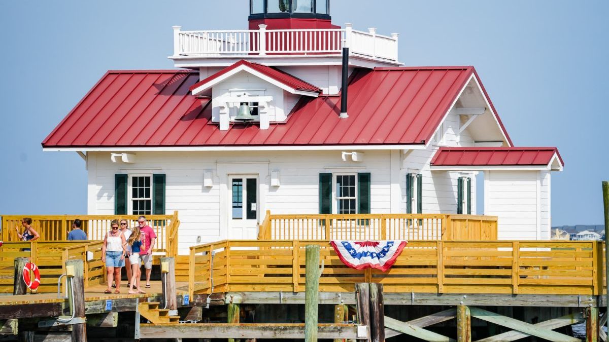 Roanoke Marshes Lighthouse stretches is perched on a deck extending 40 yards into Shallowbag Bay in Manteo. Photo: Manteo