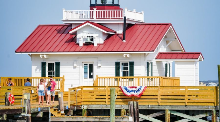 Roanoke Marshes Lighthouse stretches is perched on a deck extending 40 yards into Shallowbag Bay in Manteo. Photo: Manteo