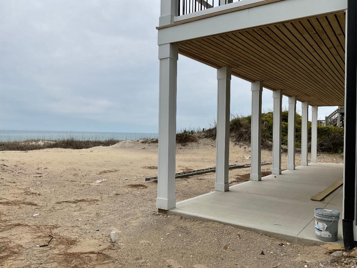 The flattening of the frontal dune at this house in Emerald Isle has town officials weighing dramatically  increased fines for violations of its dune and vegetation ordinance, which is currently a $1,000 penalty. Photo: Town of Emerald Isle