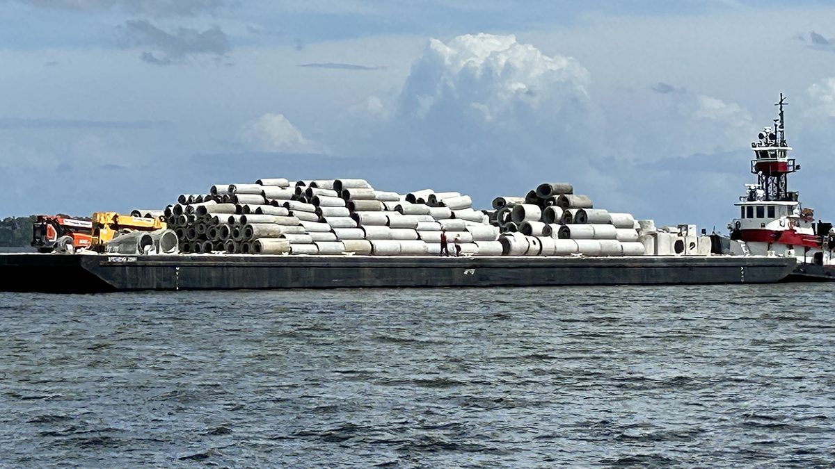 Each reef received about 1,500 tons of recycled concrete pipe and boxes, shown here aboard a barge. Photo: N.C. Division of Marine Fisheries