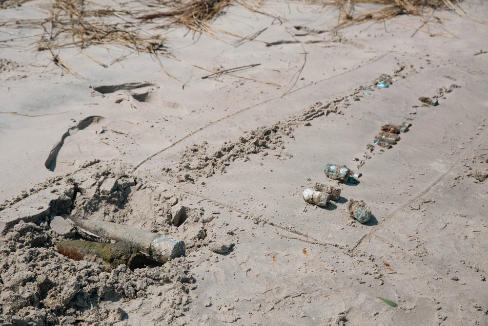 Unexploded ordnance is marked May 14 on the shore of Browns Island, part of Marine Corps Base Camp Lejeune. Photo: U.S. Marine Corps, Cpl. Daniela Chicas Torres