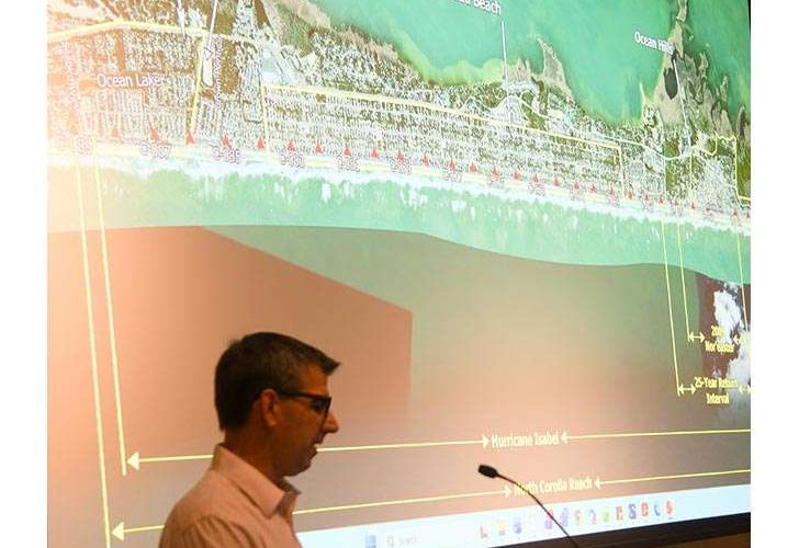 Coastal Protection Engineering Senior Project Manager Ken Willson discusses options to address erosion at North Corolla Reach around Lighthouse Drive. Photo: Kip Tabb