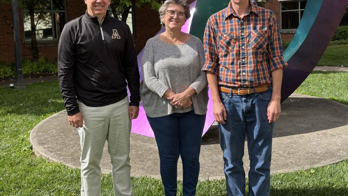 Shannon Adams, left, Karen Amspacher and Mark Coltrain pause for a photo on the campus of Appalachian State University in Boone. Photo: Courtesy, Shannon Adams
