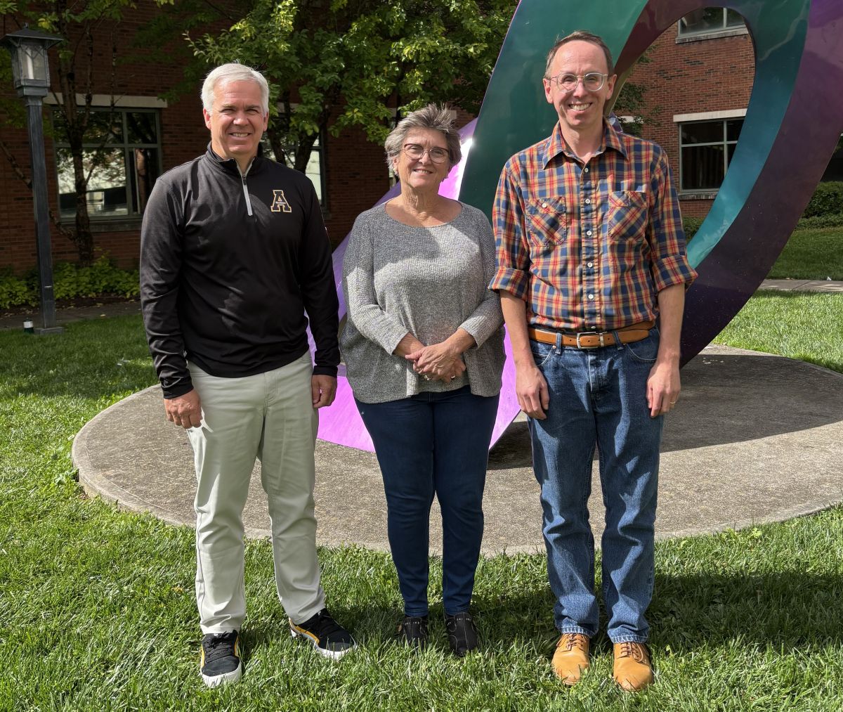 Shannon Adams, left, Karen Amspacher and Mark Coltrain pause for a photo on the campus of Appalachian State University in Boone. Photo: Courtesy, Shannon Adams