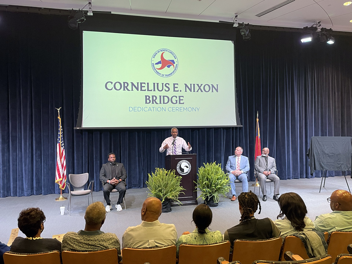 During a dedication ceremony for the Cornelius E. Nixon Bridge signs April 24 at Cape Fear Community College in Wilmington, a group of men recall the indelible example Nixon set during their teenage years. Back in the mid-1980s, they worked as fish cutters for Hanover Packing, which leased space at Nixon’s Market Street plant. Observing his legendary work ethic transformed the crew, who evolved from what their former boss described as "a bunch of kids, fishermen and hippies" into an impressive roster of engineers, marine biologists, environmental consultants, construction managers and real estate brokers. Photo: Liz Biro