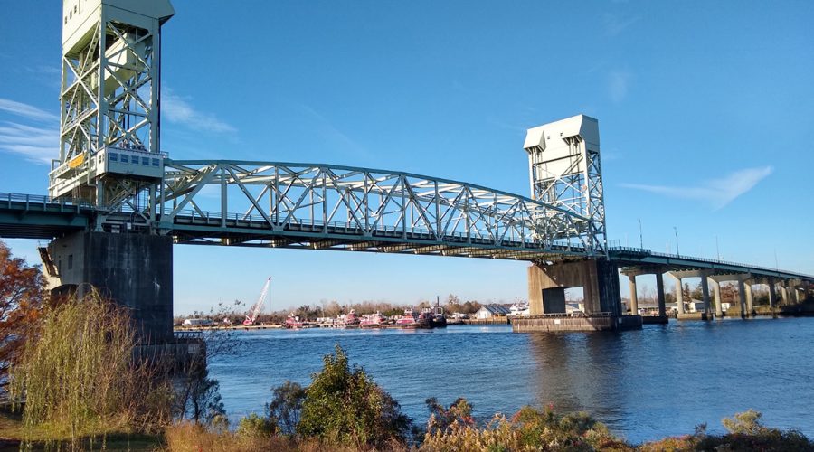 The Cape Fear Memorial Bridge, shown here as viewed from Dram Tree Park, was completed in 1969 and now the four-lane, vertical-lift bridge can no longer effectively service current traffic demands, officials say. Photo: PlaneManRockFan/Creative Commons